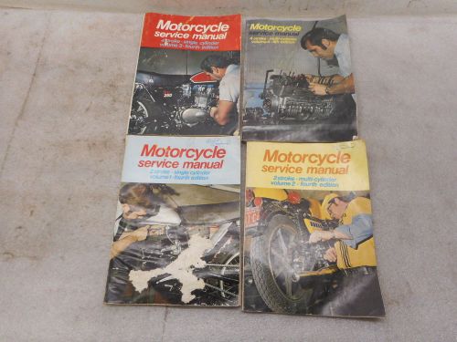 Four vintage 70's era motorcycle service manuals for two &amp; four stroke motors.