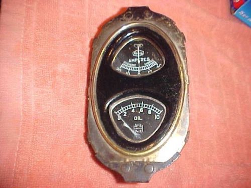 Antique automobile oil pressure &amp; amp meter - dash board gauges - chev. i think
