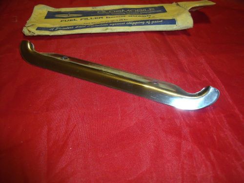 Oldsmobile nos gm  accessory fuel filler door guards, gas door guards 982166