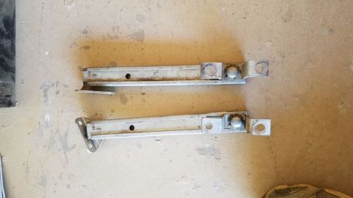 Early bronco lift gate supports