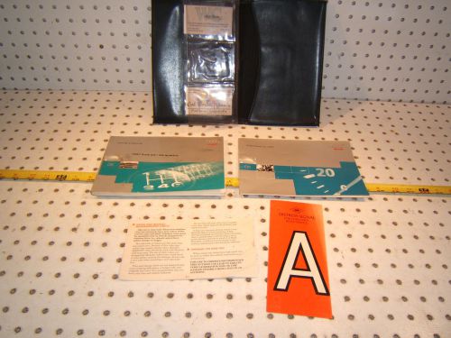 Audi a4/ a4 quattro 1997 owner&#039;s oem 1 set of 4 manuals &amp; audi black oem 1 case