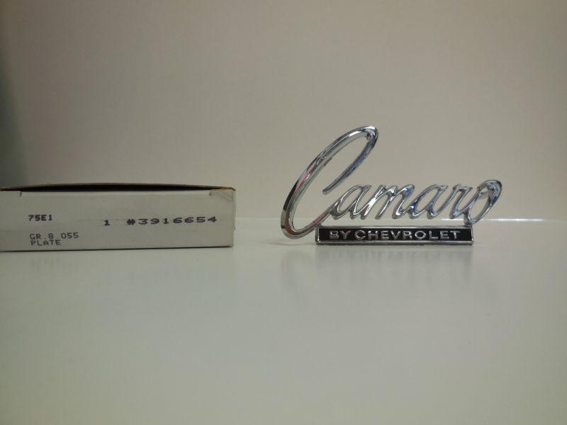 1968-69 camaro      nos gm header panel / trunk  emblem