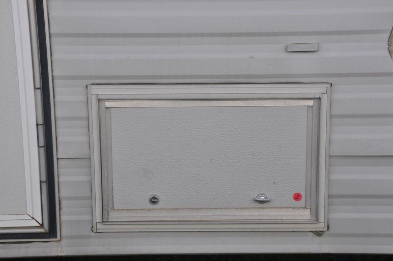 Used 20 x 12 1/2  compartment door horse trailer toy hauler& rv with key