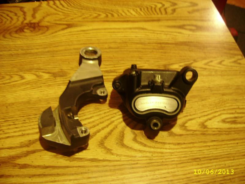 Sell GOOD USED 2010 HARLEY SOFTAIL REAR BRAKE CALIPER AND BRACKET in
