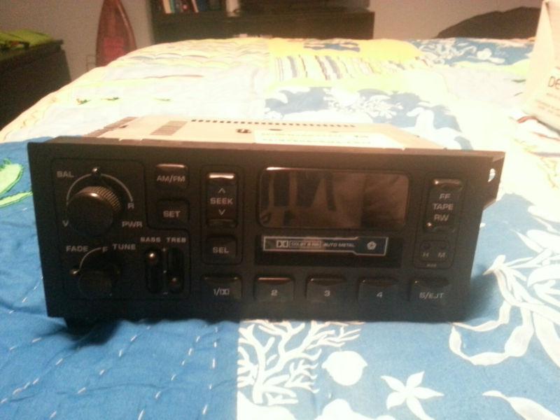 P56038933ab am/fm radio cassette cherokee caravan durango ram voyager wrangler