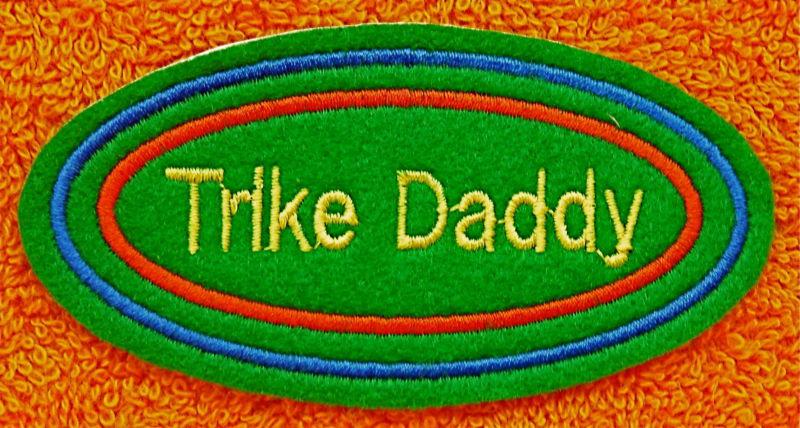 Trike daddy embroidered on  green felt sew on or iron on patch 