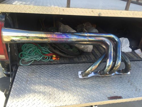 Ford 460 chrome water injected over transom headers