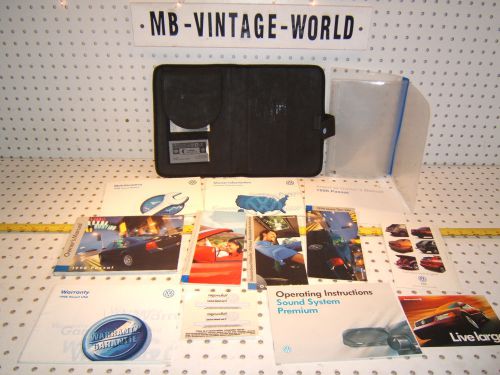 Vw passat 98 owner&#039;s manual oem 1 set of 12 booklets/ paper &amp; vw black oe 1 case