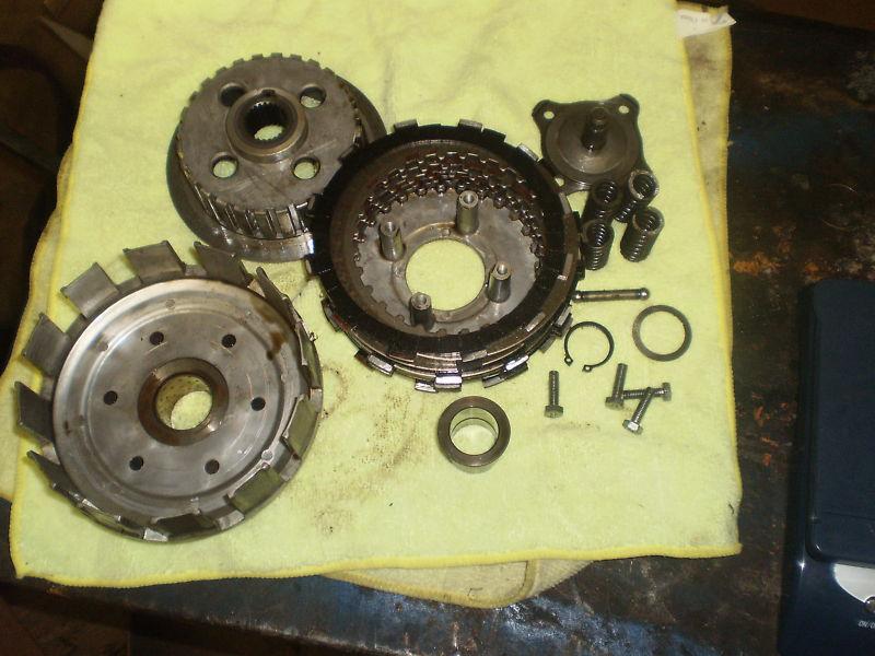 Honda 1975 cb550k4  clutch basket, fiber & metal discs, springs, hub, push rod *