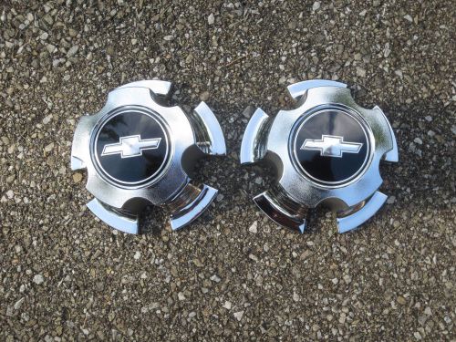 Two vintage used chevrolet plastic 5 lug center caps chrome finish