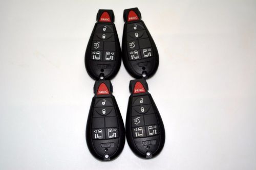 4 oem dodge chrysler fobik keyless remotes transmitter dealer lot - never used