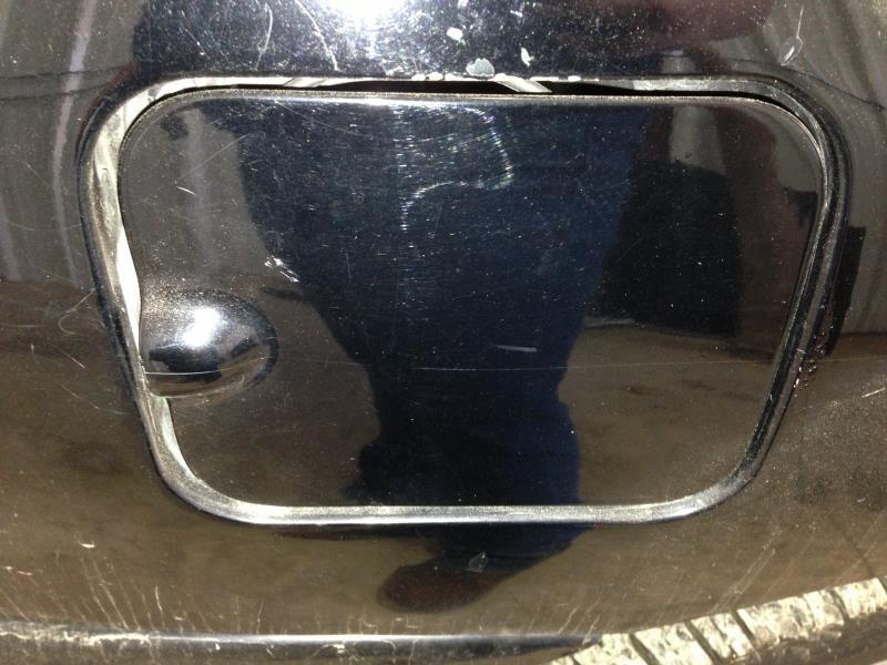 02 cavalier fuel filler door,black,coupe