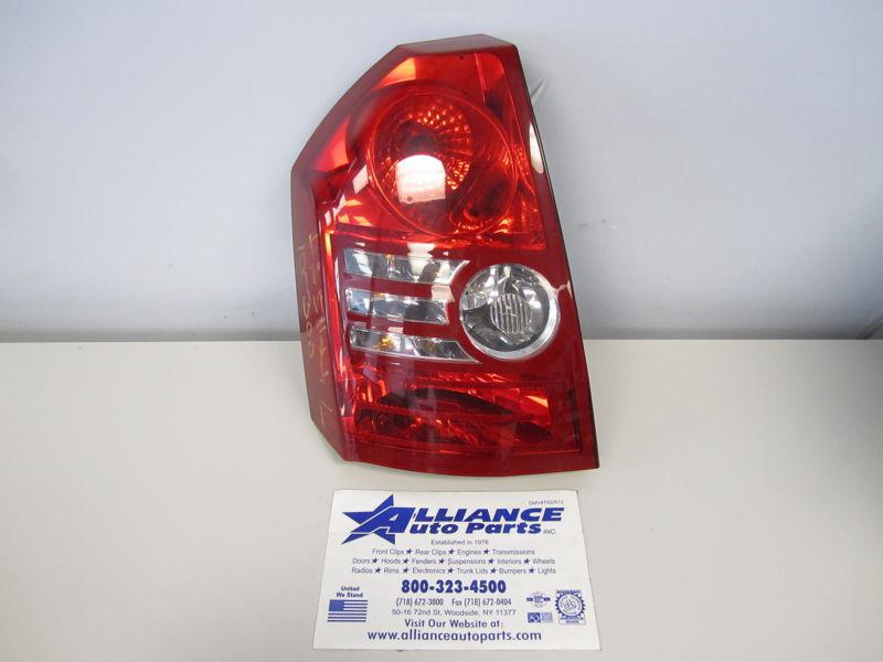 08 09 10 chrysler 300 l. tail light base and touring