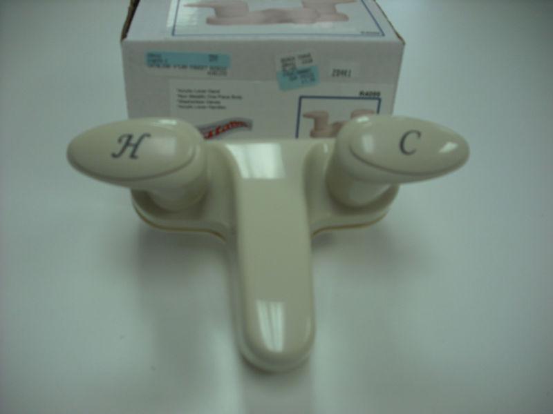 Rv lavatory faucet - off  white - two handles - 4" between centers - new!