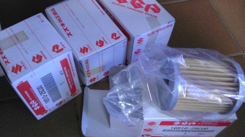 Lot of 4 new genuine suzuki oil filters fits arctic cat atv too