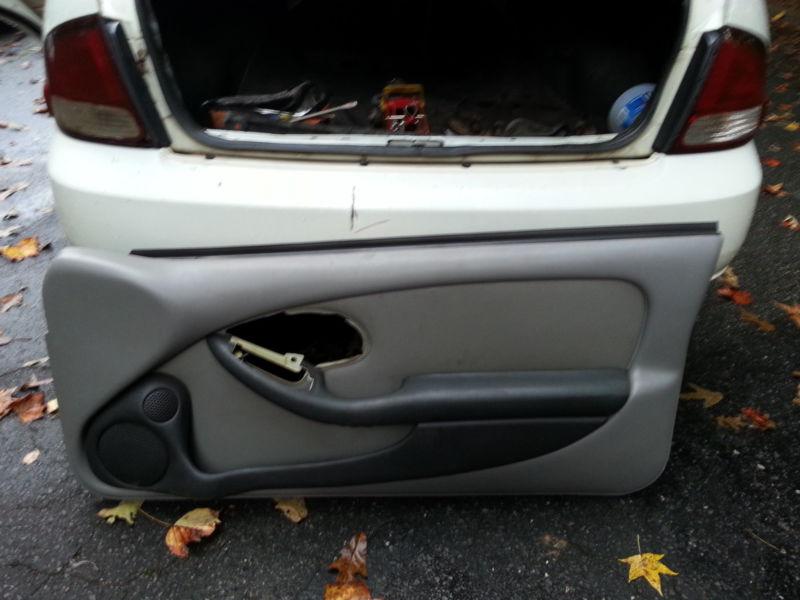 93-02 trans am rh driver side ebony grey leather door panel used 