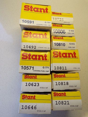 Lot of 11 new in box stant fuel gas caps some locking 10492 10571 10591 10806  h