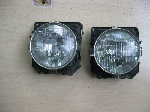 Volvo 240 dual round 7” headlight buckets 242 244 245 turbo ipd gt matched pair