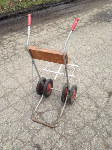 Vintage antique outboard boat motor engine stand