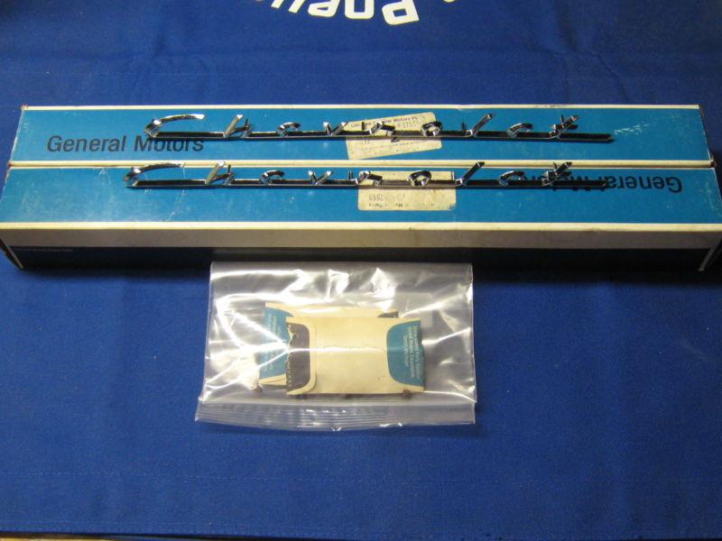 1955 1956 chevrolet 150 210 fender / quarter script emblems nos gm #3759599