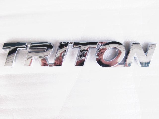 Mitsubishi triton letter logo badge emblem 