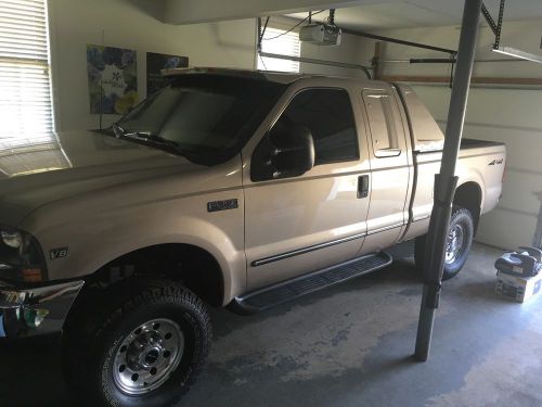1999 ford f250 7.3 diesel 4x4 low miles!