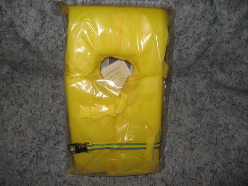 Yellow colored child kids sized small universal life vest jacket