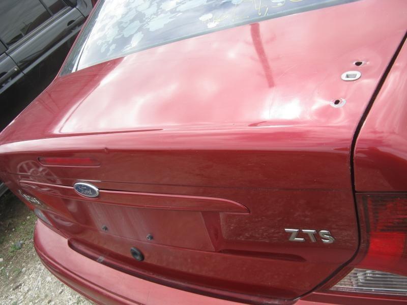 00 01 02 03 04 focus trunk boot lid sedan 4dr w/ spoiler 17281