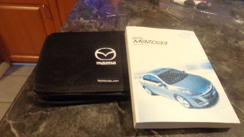 Original owners manuel 2010 mazda 3 with case with 6 additional books