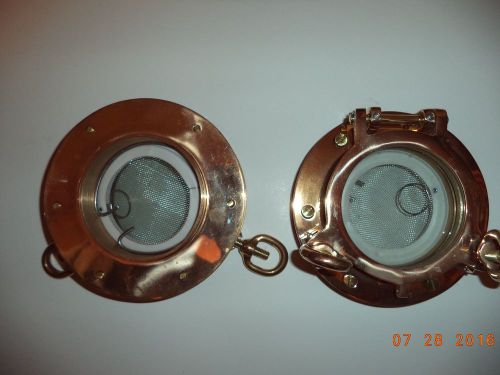 A pair of 4&#034; round polished bronze portholes