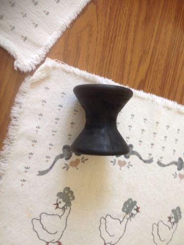 Black rubber bow roller 3inches wide 1/2 inch center hole