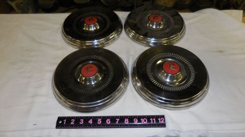 Four 10 inch rambler hub caps