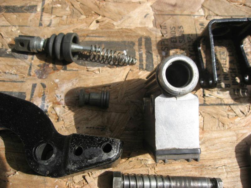 Find HARLEY DAVIDSON REAR BRAKE CALIPER, PADS, MOUNTING BRACKET in