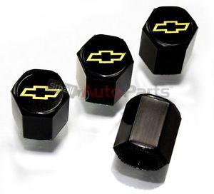 (4) chevrolet yellow bowtie logo black abs tire/wheel stem air valve caps covers