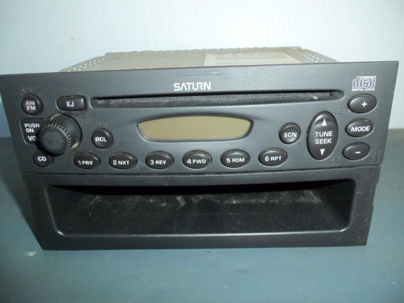 00 01 02 saturn sl radio cd player model 21024016 with storage compartment