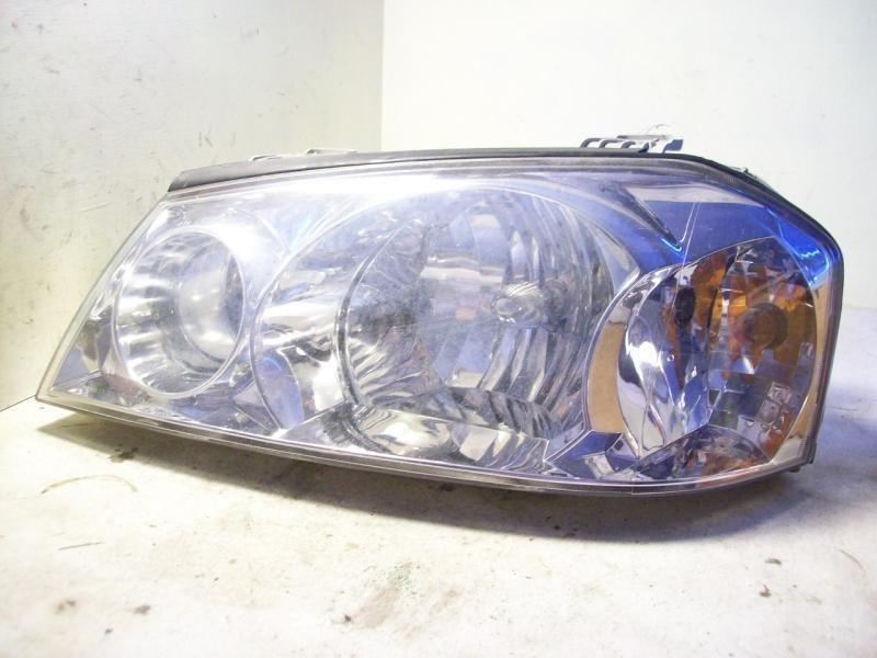 01 02 kia optima magentis left headlight 45152