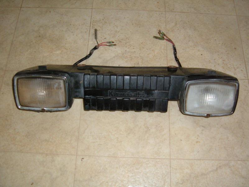 1997 kawasaki bayou 300 4x4 headlight / grill assembly