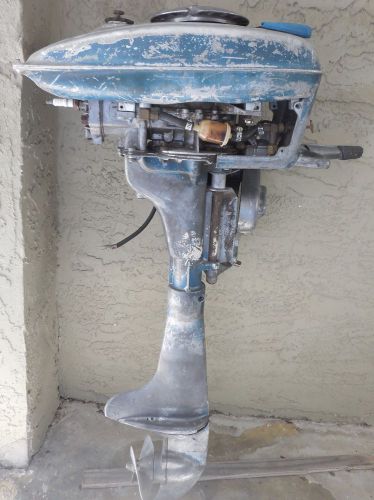 Vintage champion boat motor