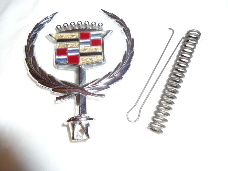 Cadillac hood ornament with installation spring