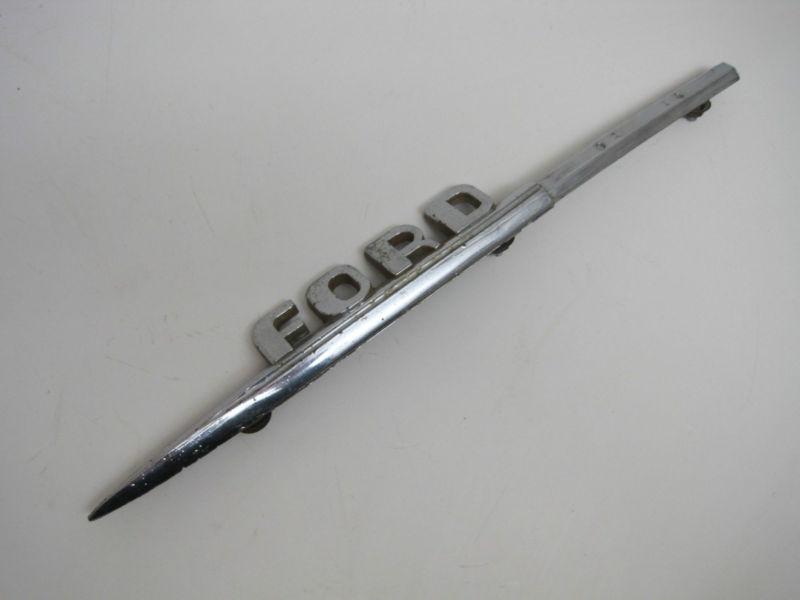 Ford side fender trim emblem spear with fasteners 