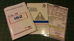 1978 cessna 152 pilots operating handbook, supplement book, and a checkmate