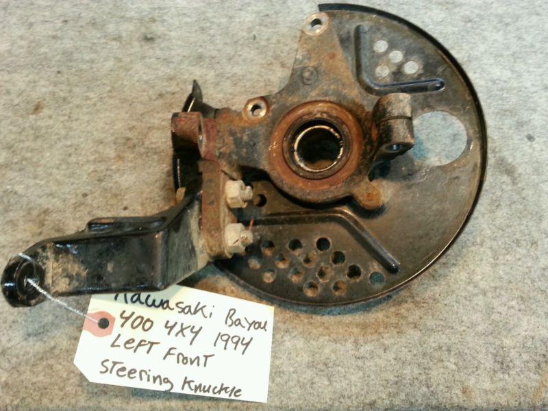 Kawasaki bayou 400 4x4  1994 left front steering knuckle.