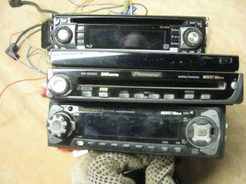 Radio / cd player 3 after market two pioneer one unknown