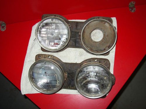 1969 olds cutlass head light lamp buckets fits next to grille 350 400 455 442
