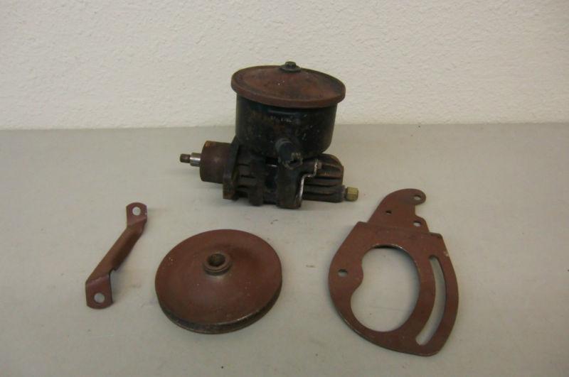 1956 1957 cadillac power steering pump and brackets 