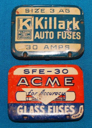 2 vintage automobile fuse boxes with glass fuses inside