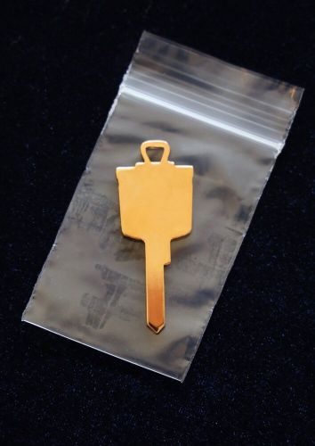 Gold plated studebaker crest key blank