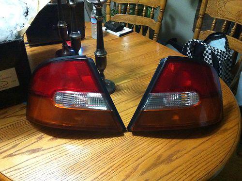 Nissan 97-99 tail lights 