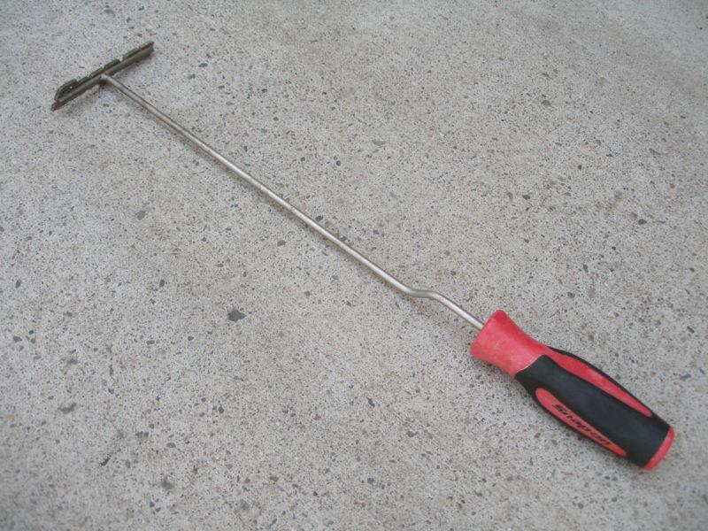 -------->   snap-on 18"long, red soft handled branding iron - **exoticly cool**
