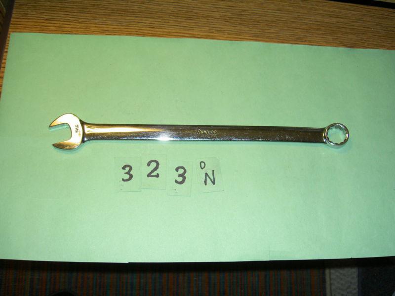  snap on, under lined logo, # oexl22, 11/16" sae long combination wrench.